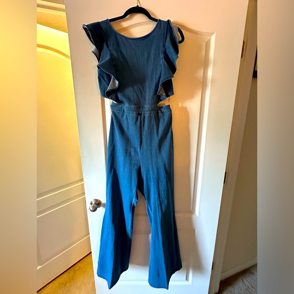Flutter sleeve denim jumpsuit with side and back cutouts